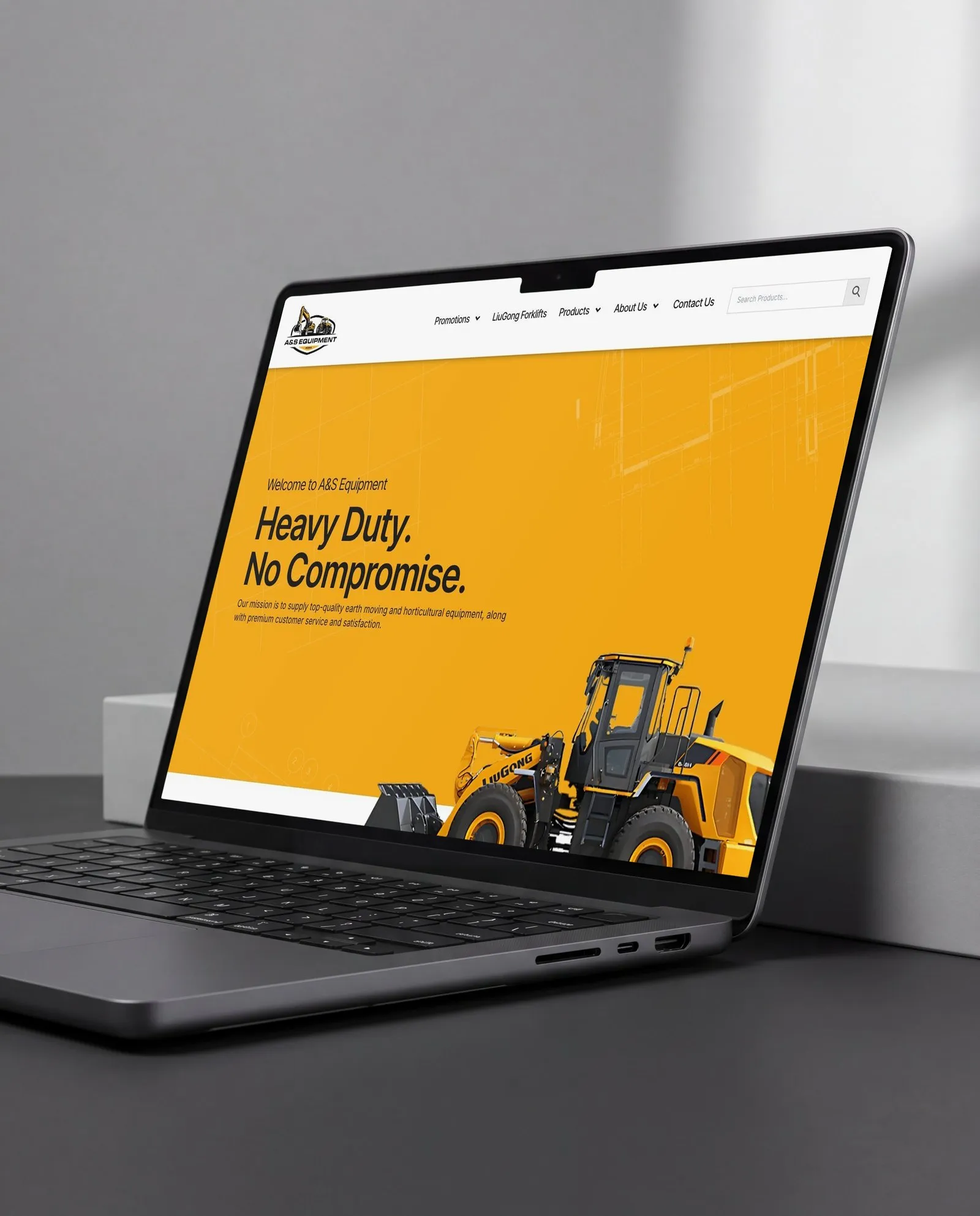 The A&S Equipment website on a laptop