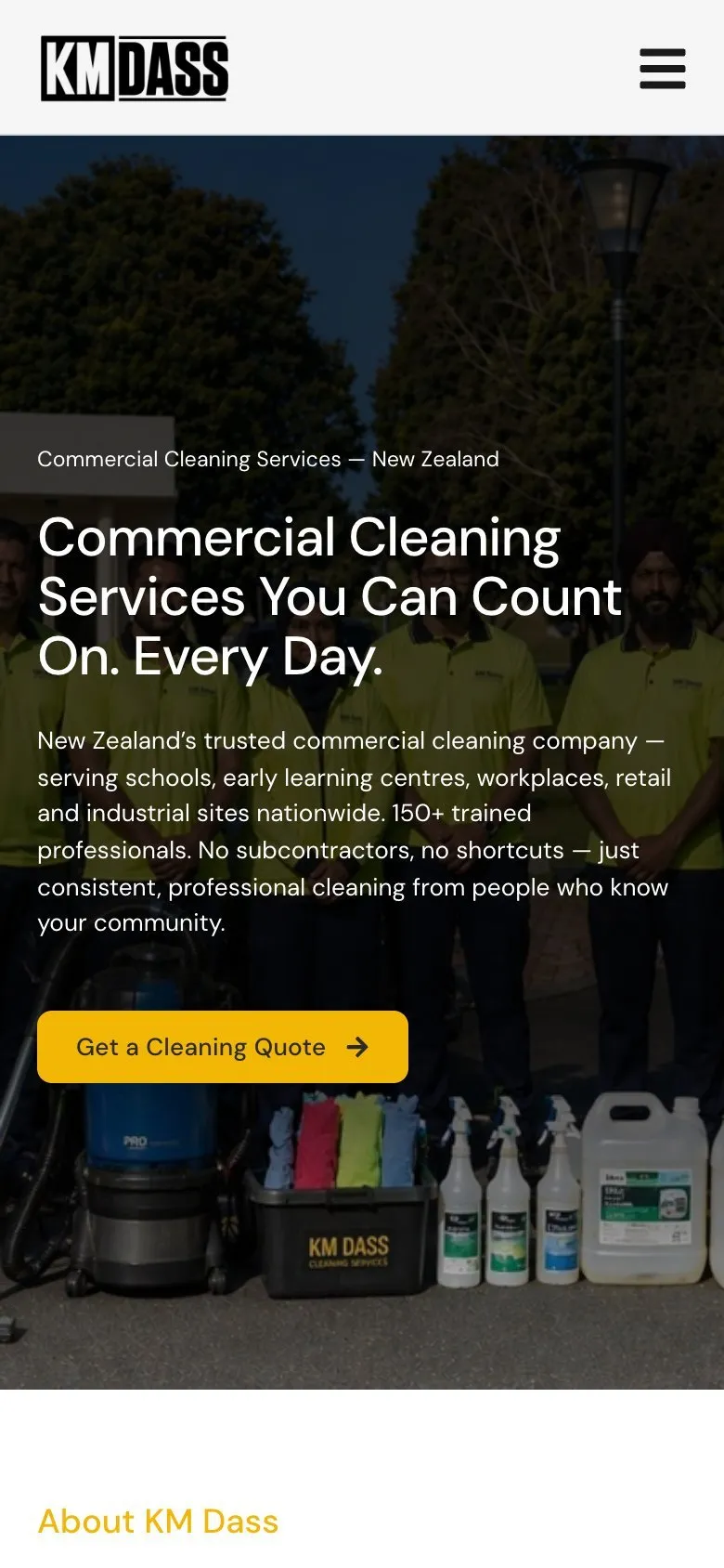 The KM Dass Cleaning homepage on a phone