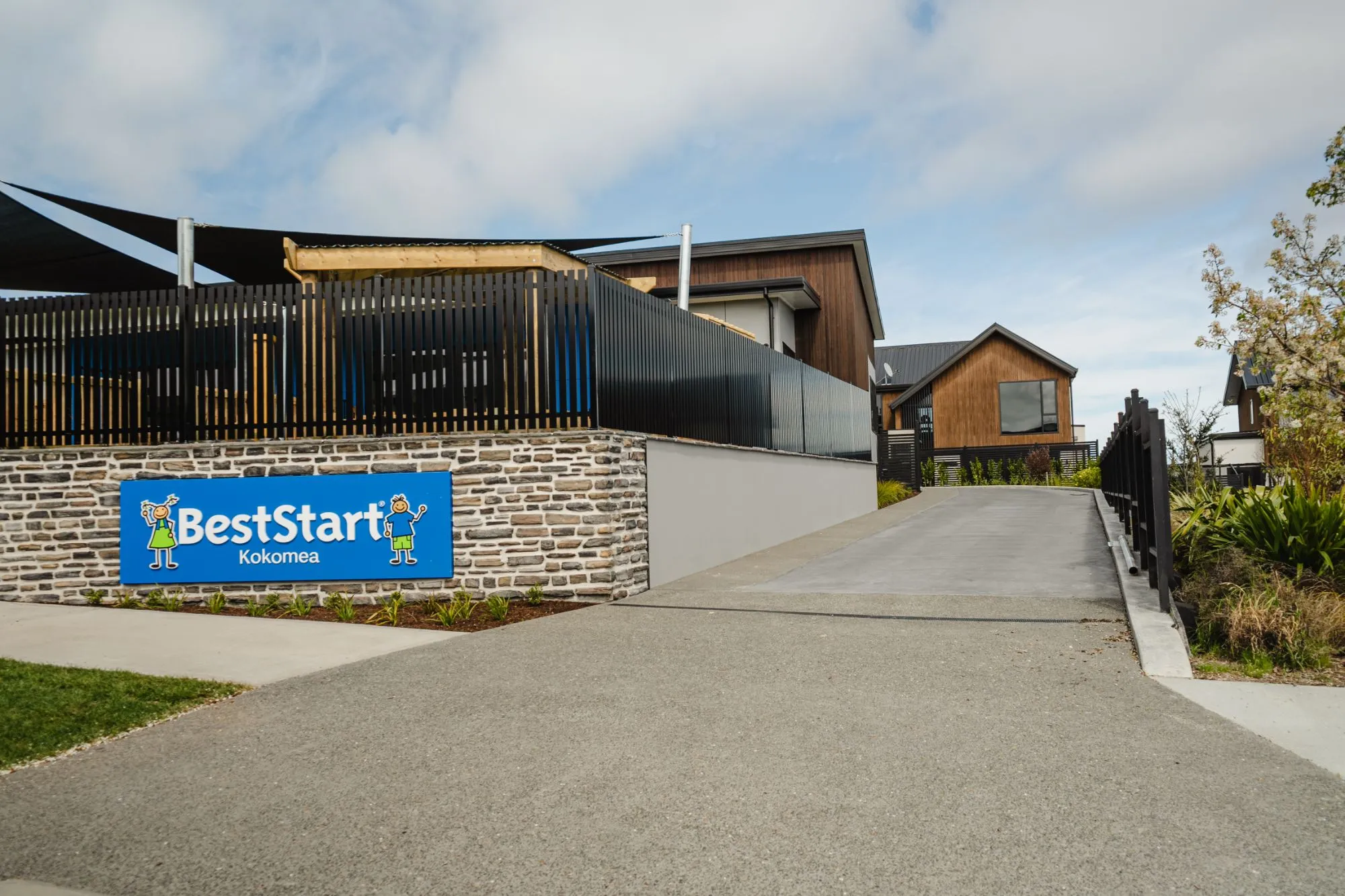 The BestStart Kokomea entrance and finished concrete driveway