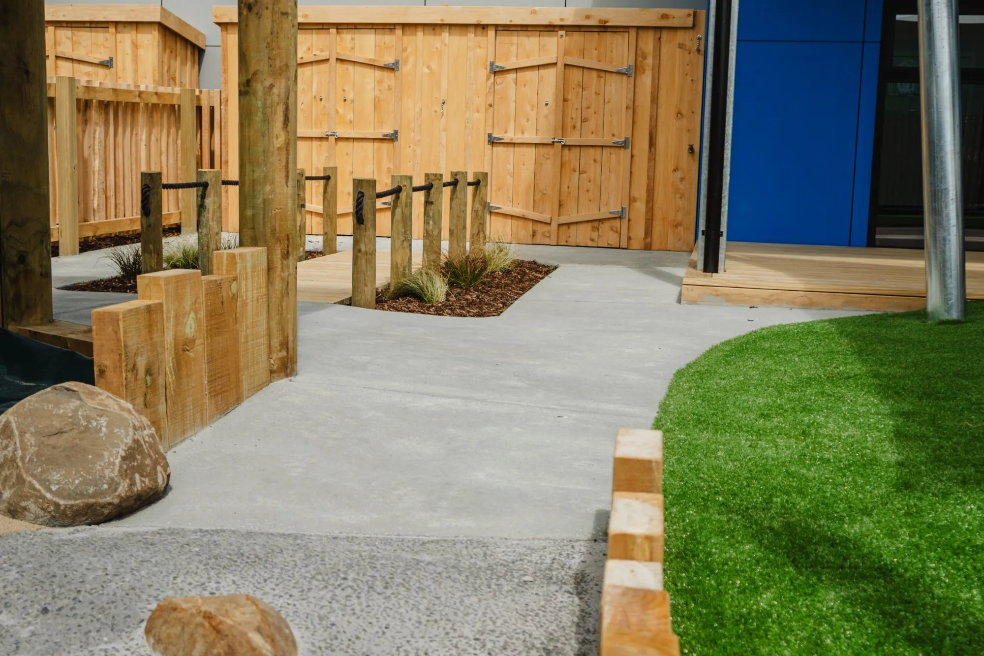 A finished concrete path through the BestStart playground